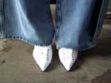 Sneakers point heels