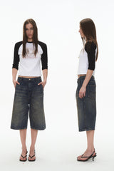 Distressed Pleated Denim Shorts