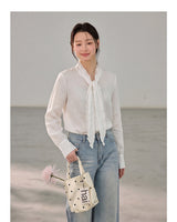 French ribbon tie V-neck blouse