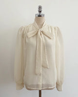 Cave Pearl Tie Puff Blouse