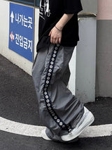 エスニックテープナイロンパンツ