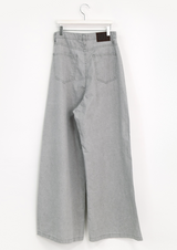 over wide gray pants