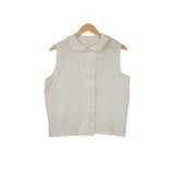 burring sleeveless blouse