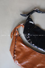 Punching Half Moon Round Shoulder Bag