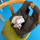 leaves girl bag