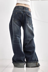 Cuffed cat washing denim pants