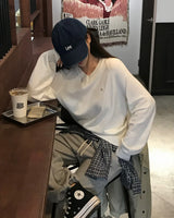 キャラメルカラーVネックニット