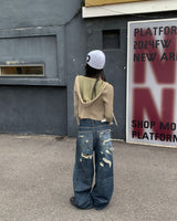Back damage denim pants
