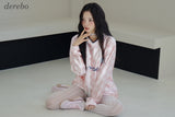 satin pink V-neck block core sweatshirt