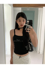 Marshmallow beaded black sleeveless top