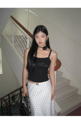 Marshmallow beaded black sleeveless top