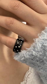 Black metal twinkle dot ring