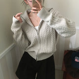 [BELLIDE MADE] ペンダント付きケーブルニットジップアップ
