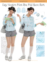 BETWEENAND summer shirt with mint blue stripes, diamond-encrusted waistline, and short sleeves