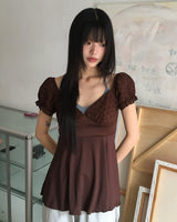 Kiaco Heart Neck Puffed Ribbon Punching Short-Sleeved Blouse
