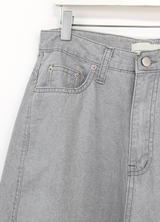 over wide gray pants