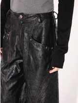 Relaxed and loose eight-inch leather pants with texture sensation