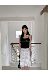 Marshmallow beaded black sleeveless top