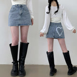 Puni two-button heart printed denim mini skirt