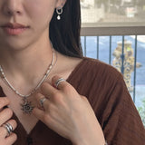 Circle drop earring