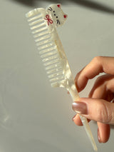 White cat hair brush
