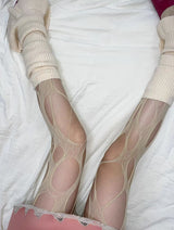 Beige big punching stockings