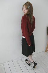 Rough damaged cardigan
