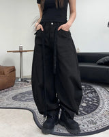 Pale studded strap pants
