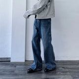 Flared Washed Denim Trousers