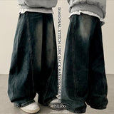 Judd waist back banding diagonal incision deep washing denim wide pants