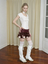 Emoha Stylish Low-Rise Mini Skirt with Glossy Cow-Print Calf Hair Paneling