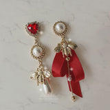 The Royal Red Queen Bee Piercing