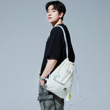 HOLYNUMBER7 X DKZ アイボリーバッグ_アディショナルバッジ