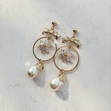 デイジーアンドリボンピアス / Gold Daisy and Ribbon Piercing