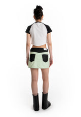 アシメトリックボタンミニスカート / ASYMMETRIC BUTTON MINI SKIRT (MIXED FABRIC)