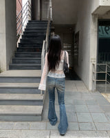 Scratch boots cut denim pants