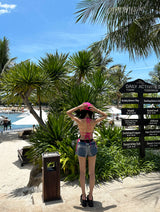 Hot pink colored string bikini