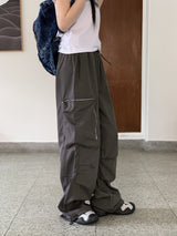 アコンジッパーポケットナイロンワイドツーウェイジョガーパンツ/ Acorn Zip Pocket Nylon Wide Two Way Joggers