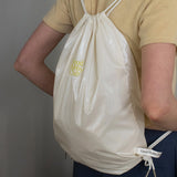 グロッシーストリングバッグ / GLOSSY STRING BAG_CREAM