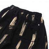 bleach side tuck string sweat pants