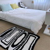 Black & white oval square tufting rug