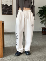 チャレンジピグメントレタリングワイドコットントレーニングパンツ / Challenges Pigment Lettering Wide Cotton Training Pants