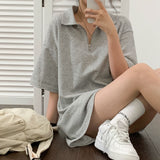 ショートスリーブドアノラックミニドレス / A short-sleeved anorak mini dress