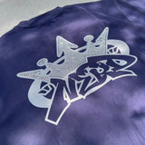 9090 × NERDUNIT King Logo Rhinestone Tee
