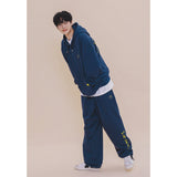 HOLYNUMBER7 X CHOI BYUNGCHAN チックグラフィクストレーニングパンツ