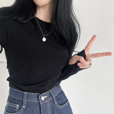 エクステンデッドスリーブラウンドネックTシャツ