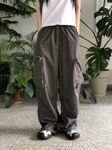 アコンジッパーポケットナイロンワイドツーウェイジョガーパンツ/ Acorn Zip Pocket Nylon Wide Two Way Joggers