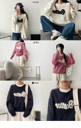 ウールボリューム刺繍バターニット
