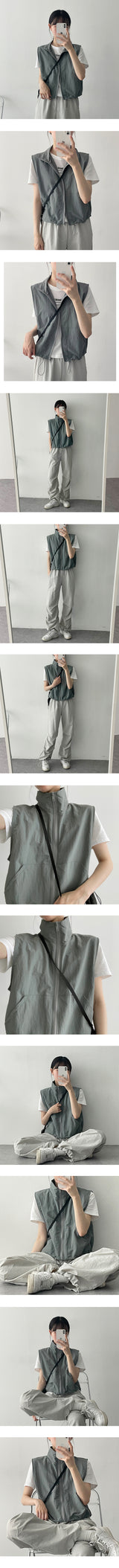 ナイロンストリングクロップドベストジップアップ / Shbonylon String Cropped Vest Zip-Up