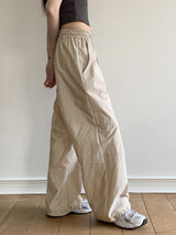 ピディナイロンスリット2ウェイロングワイドジョガーパンツ / Pidi Nylon Slit Two-Way Long Wide Jogger Pants